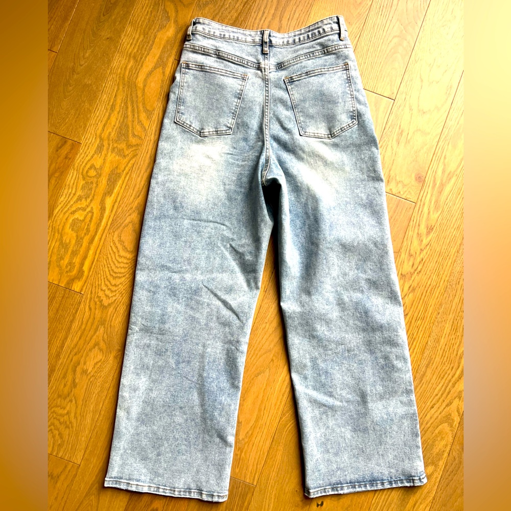 Asymmetrical zipper high waisted jeans.  Never worn